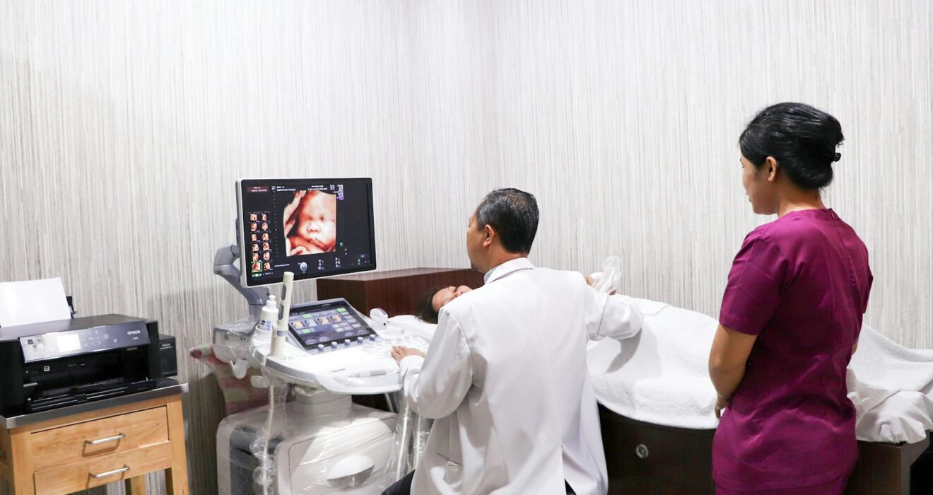 a couple of people that are in a room