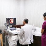 a couple of people that are in a room