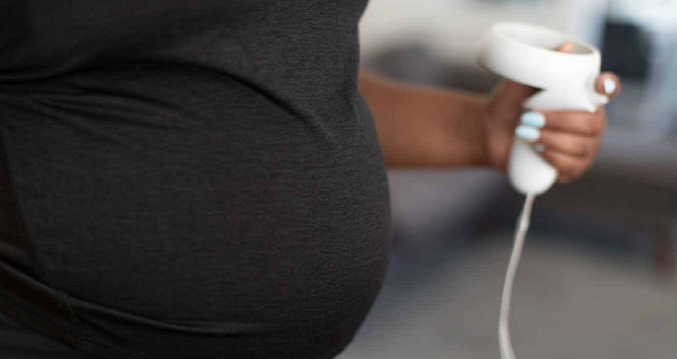 a person holding a video game controller