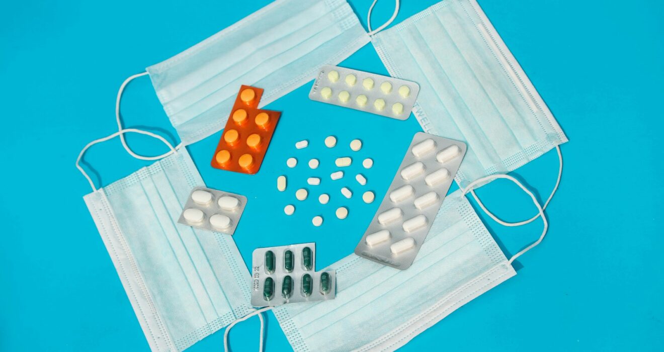 white and red lego blocks on white textile