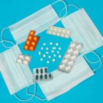 white and red lego blocks on white textile